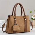 Elegant tweed tote bag with V-pattern and brown leather trim, featuring gold metal accents - Khaki