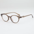 Ovale Retro-Sonnenbrille in transluzentem Braun mit rautenförmigen Metallnieten - Blaulichtschutz / Klarsicht Tee Rahmen Anti-Blaulicht