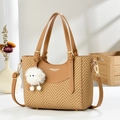 Brown leather and herringbone straw tote with plush charm and adjustable strap - Apricot