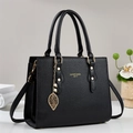 Sac à main en cuir noir avec pendentif feuille dorée et bandoulière réglable chic - Noir