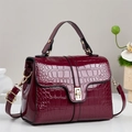 Luxury burgundy patent leather handbag with crocodile pattern and golden metal twist lock - Red