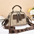Vintage retro crossbody handbag in beige faux leather with elegant brown trim and wide strap - White