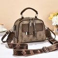 Vintage patterned crossbody handbag with brown leather trim and adjustable strap - Coffee