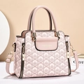 Pink embossed floral faux leather handbag with adjustable strap for women commuters - Pink