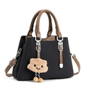 Chic black quilted tote bag with brown handles and a cute cloud charm for women - Black