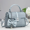 Light blue tweed handbag with silver hardware and decorative charms for 2025 women fashion - Blue