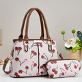 Elegant cherry print faux leather tote bag set with matching pouch and gold hardware - Apricot