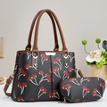 Detail of black cherry print tote bag and matching pouch with premium lychee texture - Black