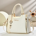 Elegant white patchwork handbag with woven texture and gold heart charm for women - Off White