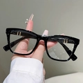 Detail of black square frames with gold metal accents on temples for a stylish commute - Black Frame Clear Lens