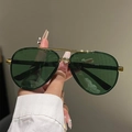 Detail of aviator sunglasses featuring green lenses, gold metal double bridge frames - Green Gold Frame Green Lens