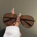 Detailed close-up of brown pilot sunglasses with gold double bridge and plastic frame - Tea Gold Tea Lens