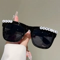 Close-up of black square sunglasses with white Just Married letter beads for bridal parties - Black Frame Black Grey Lens
