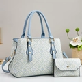 Elegantes Set aus Handtasche und Geldbörse mit hellblauem geometrischem Blumenmuster - Blau