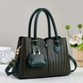 Dark green woven handbag for women featuring top handles and a mini charm pendant - Green