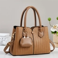 Brown woven tote bag with V-pattern texture, mini bag charm and golden hardware - Khaki