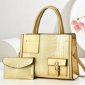 Golden embossed crocodile leather handbag set with top handle and matching small clutch bag - Gold