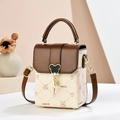Mini beige and brown leather crossbody bag featuring cartoon prints and heart buckle - Cream White with Coffee