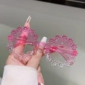 Close-up of pink flower petal frame sunglasses with round translucent lenses - Gradient Pink