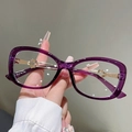 Detail view of purple resin frame with golden heart cutout metal temples and specs - Transparent Purple Frame Clear Lens