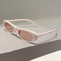Detailed side view of vintage oval sunglasses with cream frame on a display block - Creamy White Frame Champagne Lens