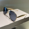 Detail of aviator sunglasses with gold metal frame and brushed texture on temples - Gold Frame Black Grey
