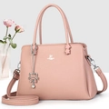 Elegant pink lychee leather handbag with silver cat pendant and David Jones logo - Pink