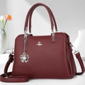 Elegante borsa a mano in pelle rosso vino con manici e tracolla regolabile - Rosso Vino
