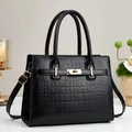 Elegant black crocodile texture handbag with gold hardware and top handles - Black