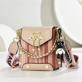 Detail of tweed crossbody bag with golden swan heart clasp, pearls and bear charm accessory - Khaki