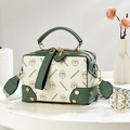 Boston style crossbody bag with vintage green trim and patterned woven shoulder strap - Green and White