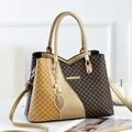 Elegant women's handbag with gold textured panel and DH monogram patterns and charms - Coffee and Gold