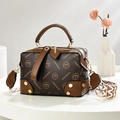Elegant Boston style crossbody bag in brown and coffee patchwork with geometric wide strap - Coffee