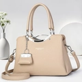 Borsa tote in pelle beige con manici curvi in metallo e tracolla regolabile in pelle - Cachi Chiaro