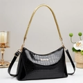 Glossy black patent leather handbag with crocodile pattern and golden braided handle - Black