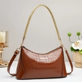 Brown crocodile pattern glossy PU leather shoulder bag with gold woven metal handle - Earthy Yellow