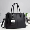 Classic black pebble leather tote bag with silver hardware and detachable shoulder strap - Black