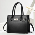 Classic black pebble leather handbag with gold hardware and removable shoulder strap - Black