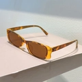 Detailed shot of retro tortoise shell sunglasses with silver hinge rivets and brown lenses - Leopard Frame Dark Tea Lens