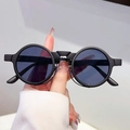 Retro round matte black sunglasses with dark lenses and geometric bridge design - Black Frame Black Grey Lens