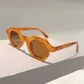 Detailed shot of retro amber tortoise shell sunglasses with silver metal rivets - Orange Tortoise Frame Tea Lens