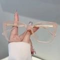 Modisches Brillenmodell in Nude Pink transparent mit goldglänzenden Metallbügeln für Damen - Gelee-Rosa Rahmen Klare Gläser