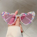 Pink heart-shaped sunglasses with white pearls and colorful candy pin frame accents - Glitter Pink Frame Pink Lens
