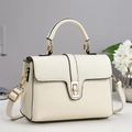 Chic beige lychee grain leather crossbody handbag with gold hardware and strap - Off-white