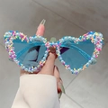 Heart-shaped party sunglasses with blue lenses, pearls, and colorful candy accents - Glitter Blue Frame Blue Lens