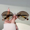 Oval metal sunglasses with dark brown gradient lenses and tortoise shell temples - Gold Frame Gradient Tea Lens Tortoise Temples