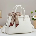 Elegant white trapezoid handbag in pebble leather with a silk scarf tied on handle - 30x21x12cm / Off White