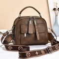 Classic brown monogram handbag with adjustable wide strap and metallic accents - Monogram Coffee