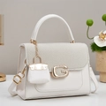 Elegante borsa a mano bianca con patta intrecciata beige e chiusura a G dorata - Bianco Sporco