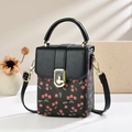 Chic black mini crossbody bag with red cherry print and golden metal clasp closure - Black